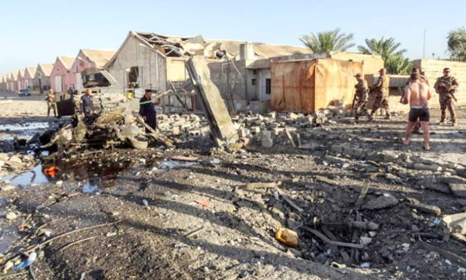 Suicide bombing wounds 19 at Iraq ballot warehouse Suicide bombing wounds 19 at Iraq ballot warehouse