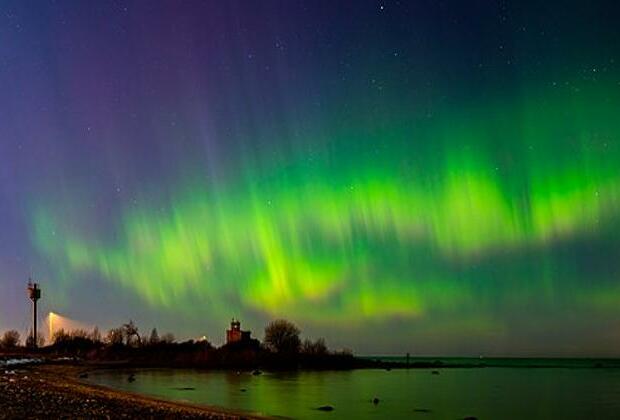 Solar storm creates colorful light displays in northern hemisphere