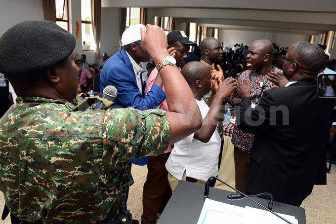    solider tries to ask  members to calm down hoto by f