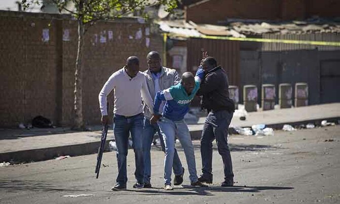 Nigeria summons S.African envoy over 'deep concern' for xenophobic attacks Nigeria summons S.African envoy over 'deep concern' for xenophobic attacks