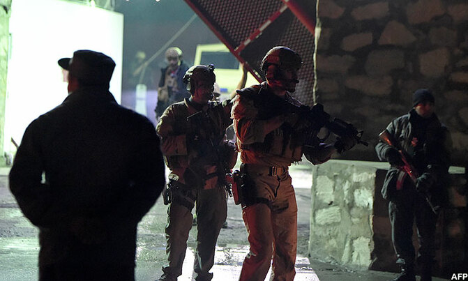 Afghan battle 'ongoing' as US soldier killed Afghan battle 'ongoing' as US soldier killed