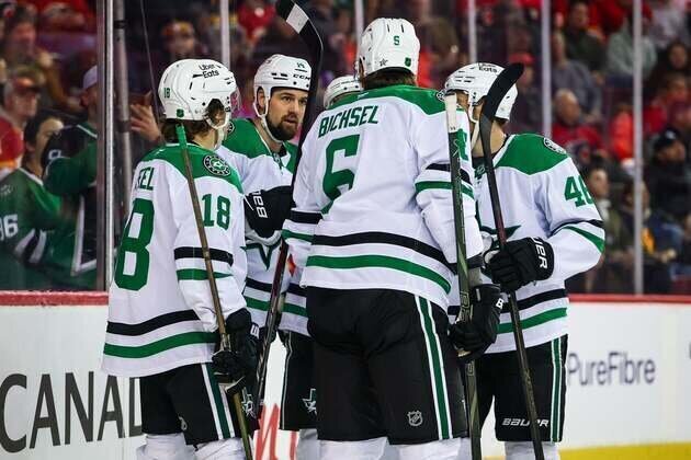 Stars stampede past Flames, push club-record win streak to 10 games
