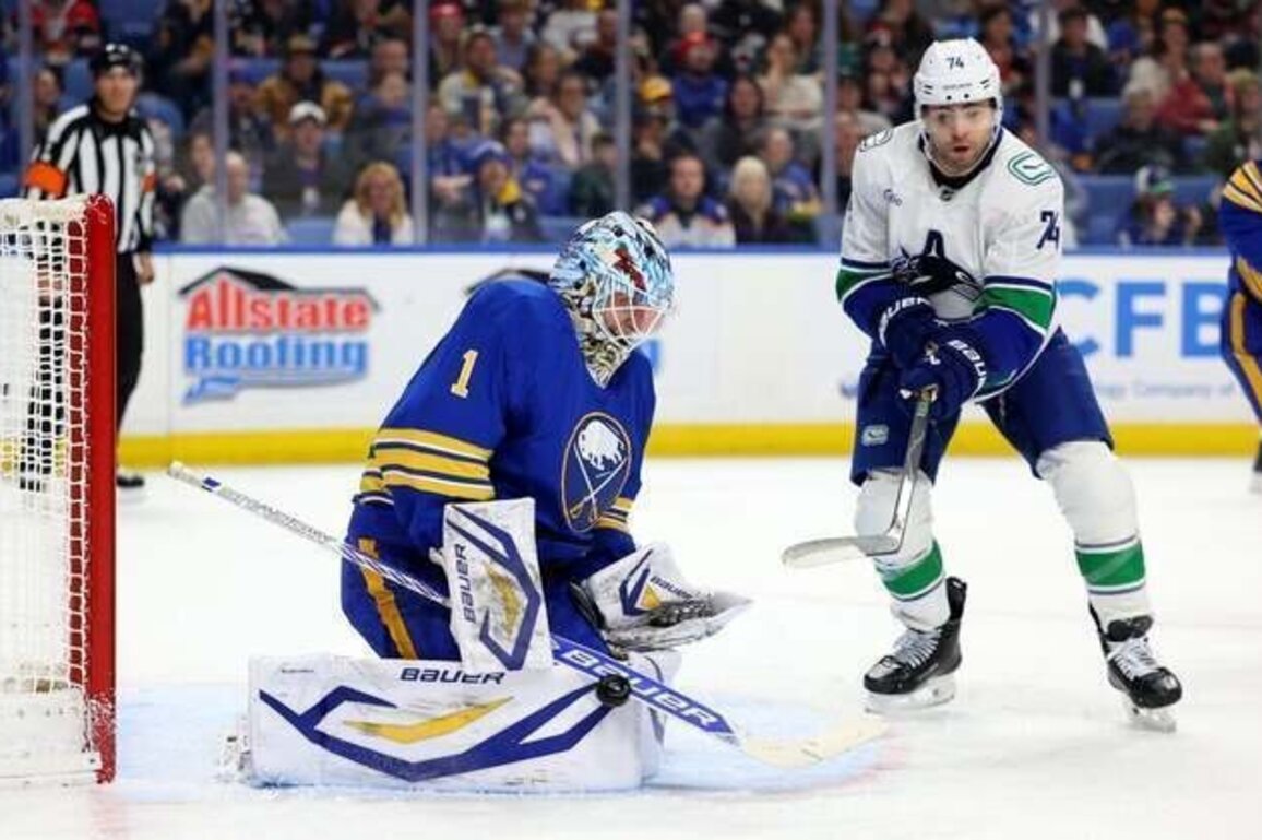 Sabres go up 4 goals, hold off Canucks' third-period rally