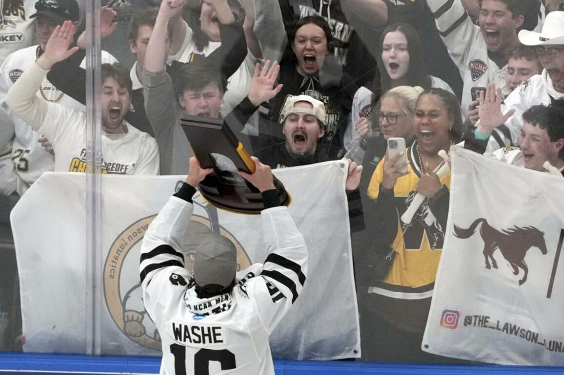 Western Michigan claims first NCAA hockey championship with win over Boston U.