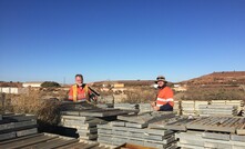 CSIRO researchers John Walshe and Adam Bath logging and sampling historical diamond drill core from the Mt Magnet core farm