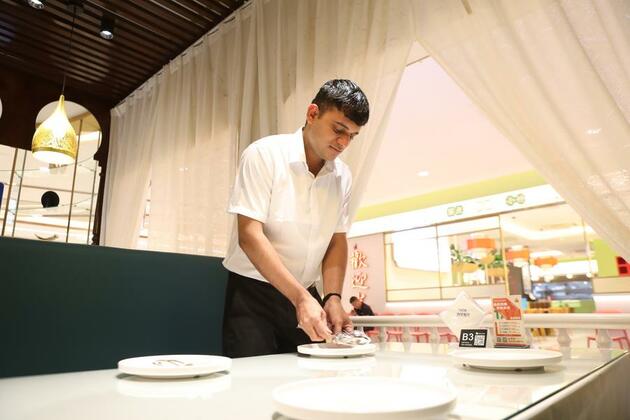 Favorable biz environment fuels South Asian culinary ventures in China