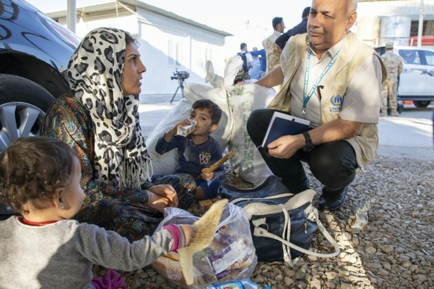 New refugees arrive to Iraq in a week of violence in northeast Syria