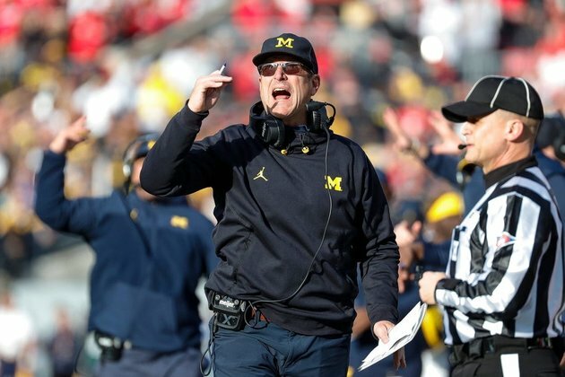 Suspension over, Jim Harbaugh returns to Michigan sideline