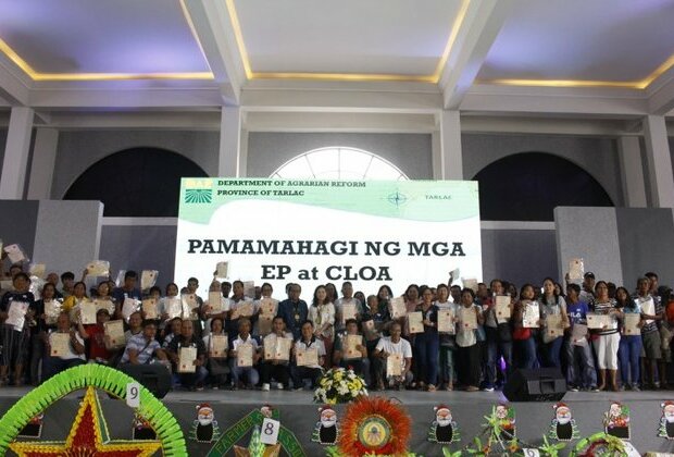 DAR turns over land titles to 147 Tarlac farmers