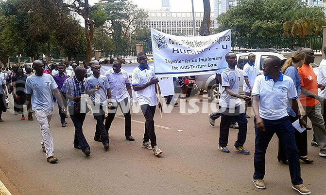 Marching in support of torture victims Marching in support of torture victims