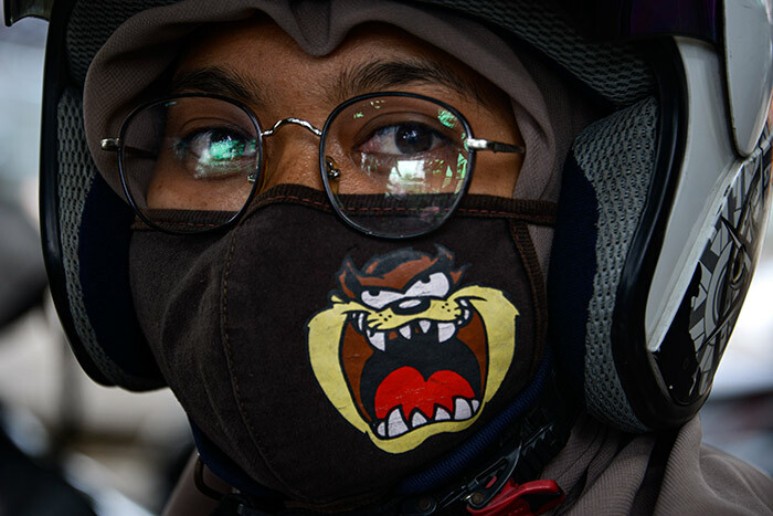 woman wears a face mask amid concerns over the 19 coronavirus in anda ceh on arch 27 2020 hoto by
