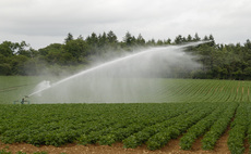 How are farmers coming together to better manage water resources?