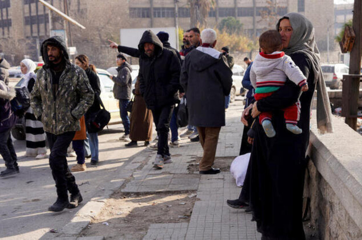 Civilians flee Kurdish areas of Aleppo as Syrian army begins shelling