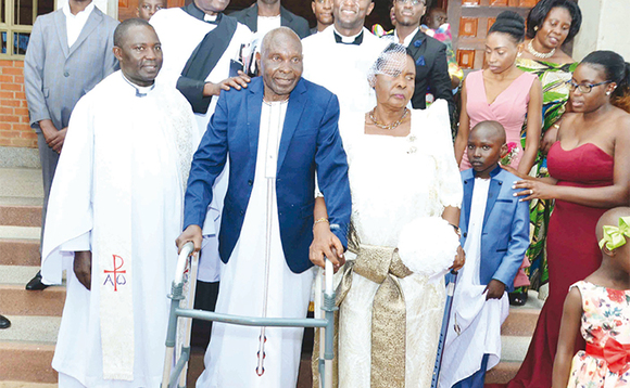 Bakayondo nga baakamala okugattibwa ku kkanisa ya St. Stephen e Mpereerwe. Ku kkono ye Rev. Lubega ne Rev Kiyingi emabega waabwe. Bakayondo nga baakamala okugattibwa ku kkanisa ya St. Stephen e Mpereerwe. Ku kkono ye Rev. Lubega ne Rev Kiyingi emabega waabwe.