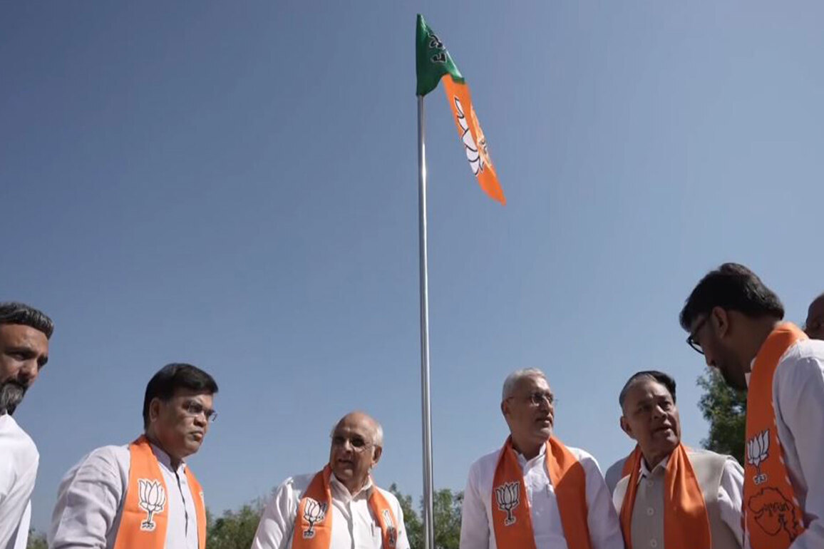 Gujarat: CM Patel along with workers hoist BJP flag in Gandhinagar on party's foundation day