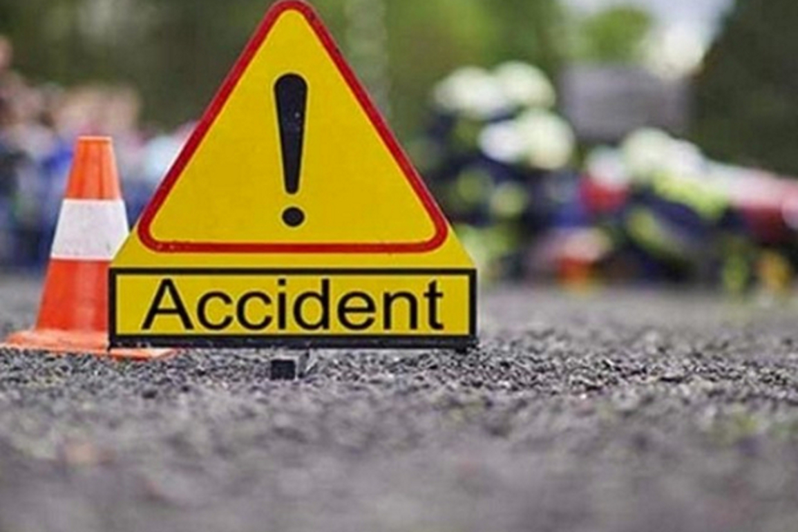 Head-on collision between two lorries; Three including both drivers dead