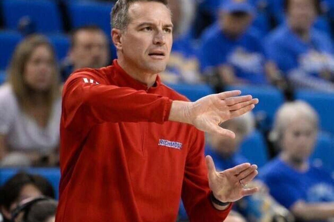 Virginia moves quickly to hire Aaron Roussell as coach
