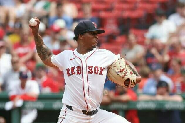 Red Sox rally past Reds to win resumed game