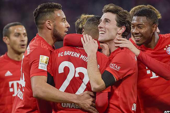  ayern players celebrate a goal against aderborn in ebruary this year