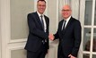  Mikko Keto, Group CEO, FLSmidth (left) shaking hands with Joachim Braun, Division President, Process Industries, ABB