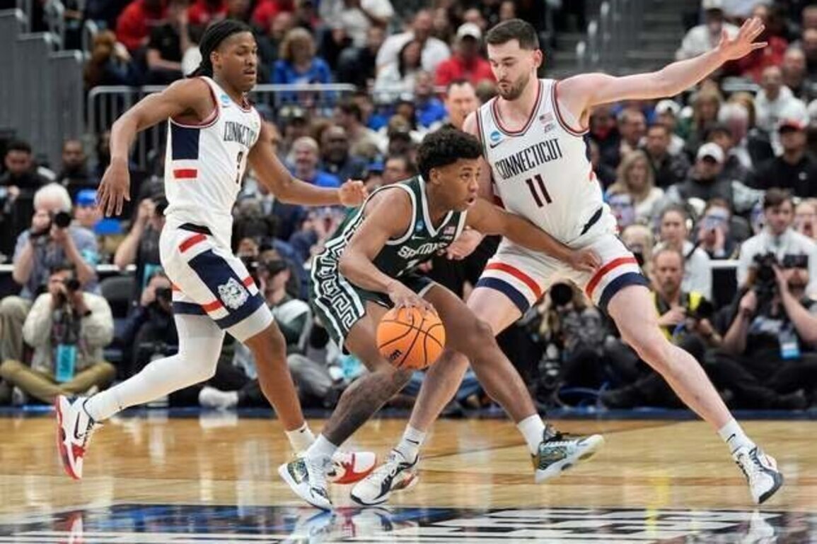 No. 2 UConn squanders lead, recovers to down Michigan State