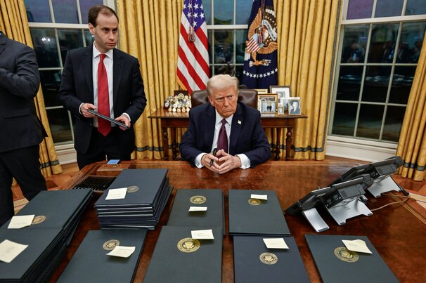 US President Donald Trump signing executive orders