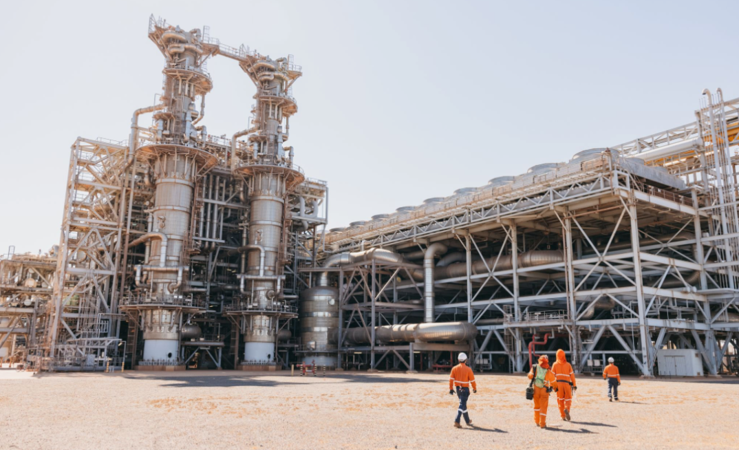 Unions demand higher wages for construction workers. Pictured Woodside's Pluto LNG plant.