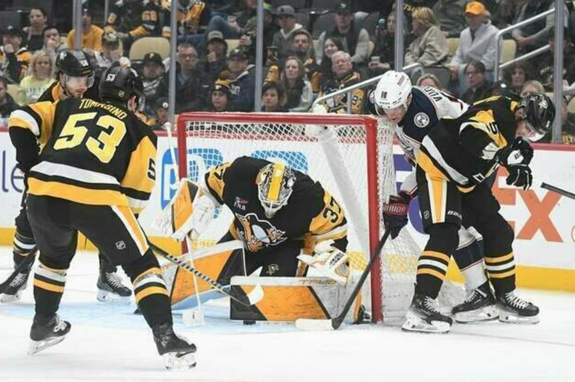 Jackets let lead slip way, but sink Penguins in shootout