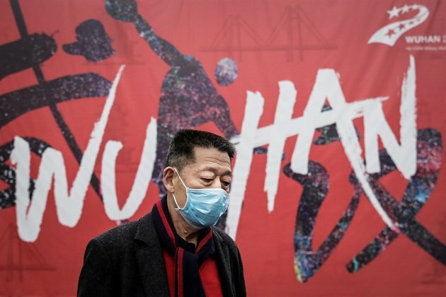 A year after first death in China, coronavirus source still a puzzle