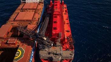 A MinRes transshipper loading Onslow ore.