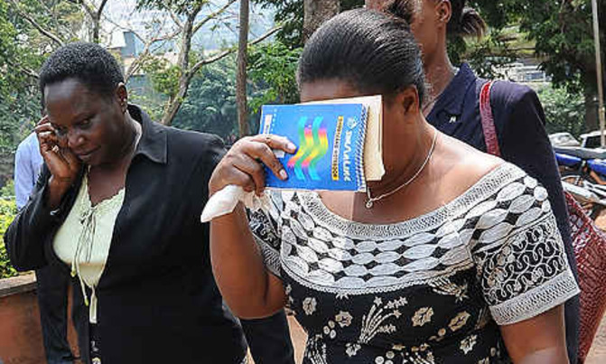 Global fund suspects released on police bond Global fund suspects released on police bond