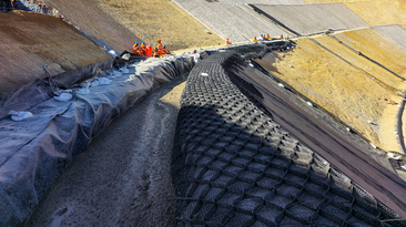 An example of slope stabilisation utilising a combination of shotcrete and geosynthetic materials