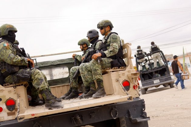 Mexican Border Cities Beset by Burning Vehicles, Blockades