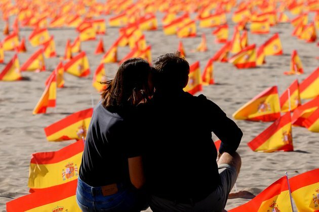 Spain imposes national Covid-19 curfew as global infection cases soar