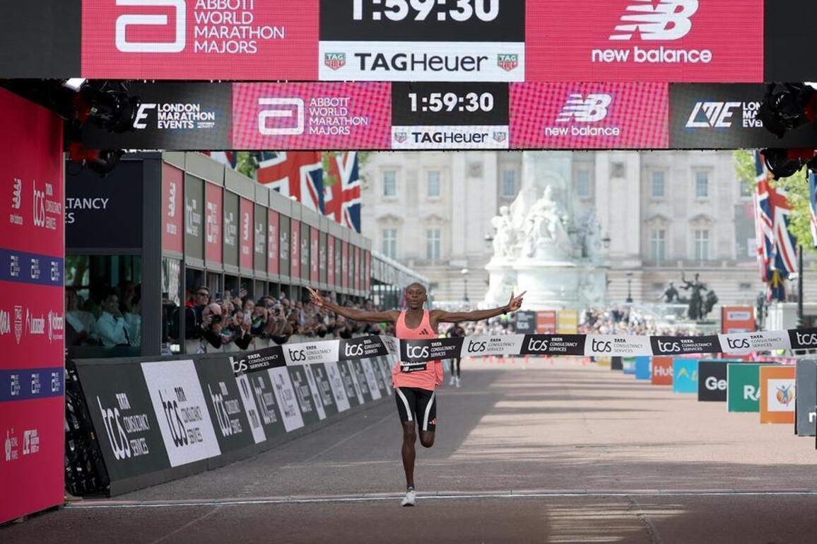 Kenya's Sawe becomes first man to run marathon under two hours