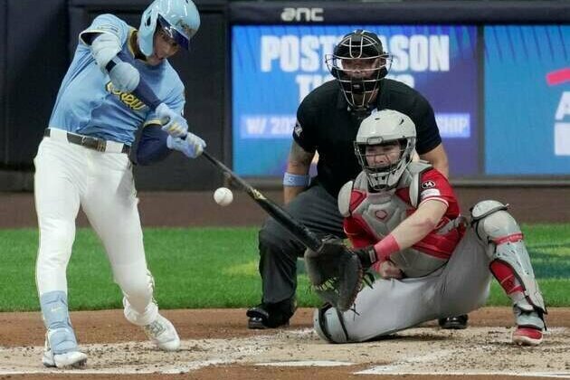 Reds limit Brewers to 3 hits, move into playoff position