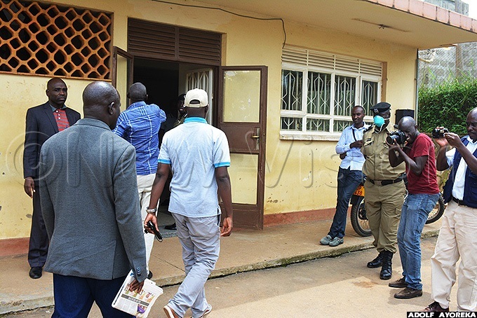  r agu being led to barara police station after he was  arrested