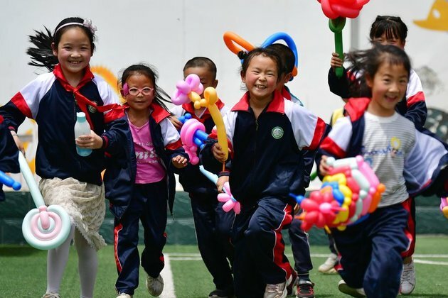 Xi extends Int&#039;l Children&#039;s Day greetings
