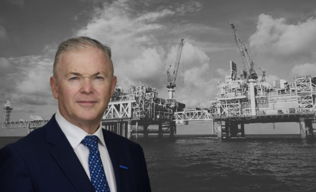 Santos presses for Barossa cashflow. Pictured: Santos CEO Kevin Gallagher alongside the Barossa oil and gas production platform.