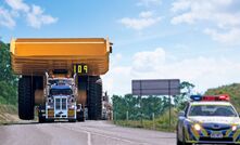 A Komatsu 830E being moved.