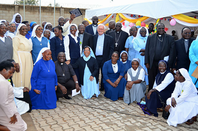  ome of the atholic eligious in ganda pose for a group photo with the atholic ishops after the launching of the year of the golden jubilee 