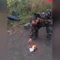 Man fighting for Russia burns his UK passport (VIDEO)