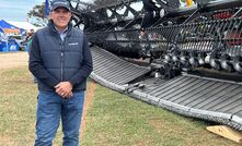 Gavin Branson, sales manager and product technical support with Waringa Distribution in South Australia, pictured alongside the Australian release of Geringhoff’s new 15.2m front with flexible frame and cutterbar.