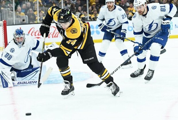 Bruins edge Lightning, clinch Atlantic crown