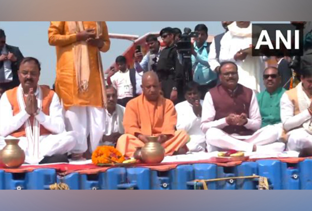 UP CM Yogi, along with other ministers perform pooja at Arail Ghat in Prayagraj