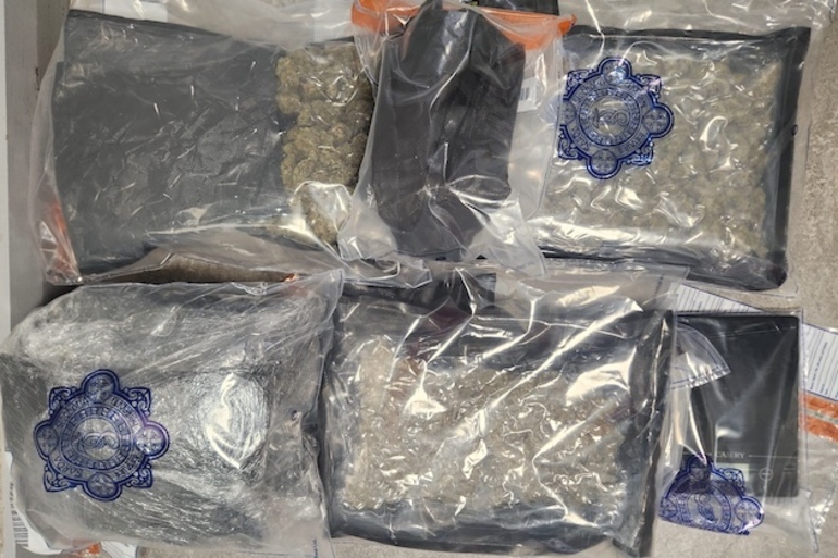 Man and woman in their 20s and 30s detained after drug raid