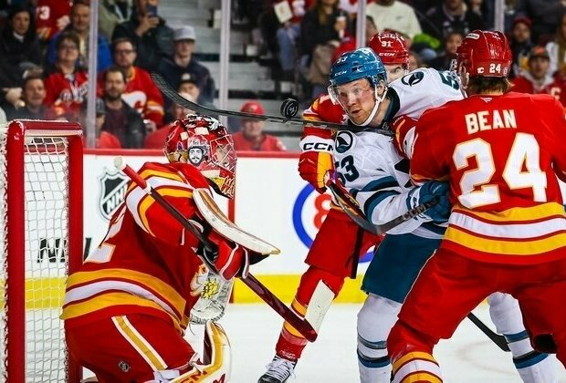 Flames edge Sharks, move closer to wild-card spot