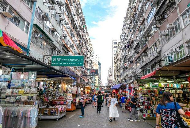 Fire in packed Hong Kong building kills five, dozens in hospital