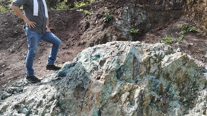 Max Resource advisor Dr Chris Grainger on the Conejo outcrop at Cesar project in Cesar, Colombia