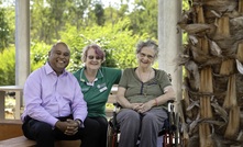  INPEX General Manager NT, Roland Houareau enjoyed a chat with volunteer Pam Smith and patient Marion Wells in the beautiful new wellness garden at Palmerston Regional Hospital. Image provided Inpex Australia. 